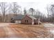 Brick home with three car garage and detached shed at 395 Paulownia Dr, China Grove, NC 28023