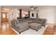 L-shaped sectional sofa in living room with hardwood floors at 395 Paulownia Dr, China Grove, NC 28023