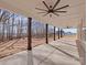 Spacious covered back porch with wood columns and views of the backyard at 4105 Parkwood School Rd # Lot 4, Monroe, NC 28112