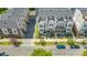 Beautiful aerial view showing the stylish townhomes and landscaped street in Charlotte at 448 E 16Th St, Charlotte, NC 28206