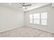 Bright bedroom with ceiling fan and carpet at 448 E 16Th St, Charlotte, NC 28206
