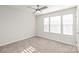 Spacious bedroom with window blinds and ceiling fan at 448 E 16Th St, Charlotte, NC 28206