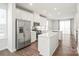 Modern kitchen with stainless steel appliances and island at 448 E 16Th St, Charlotte, NC 28206