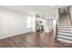 Open living room with hardwood floors and kitchen view at 448 E 16Th St, Charlotte, NC 28206