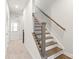 Modern staircase with dark wood and metal railing at 448 E 16Th St, Charlotte, NC 28206