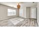 Bright bedroom with wood flooring and double closet at 4897 Annelise Dr, Harrisburg, NC 28075