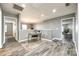 Bright hallway with wood-look flooring and workspace at 4897 Annelise Dr, Harrisburg, NC 28075