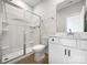Clean bathroom, featuring a shower, toilet and white vanity at 6848 Good News Dr, Charlotte, NC 28215