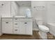 Bathroom with double vanity, toilet and tile flooring at 6848 Good News Dr, Charlotte, NC 28215