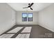 Well-lit bedroom with carpet floor and ceiling fan at 6848 Good News Dr, Charlotte, NC 28215