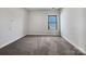 Spacious bedroom with neutral walls and carpet flooring at 6848 Good News Dr, Charlotte, NC 28215