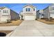 Two-story house with gray vinyl siding and a two-car garage at 6848 Good News Dr, Charlotte, NC 28215