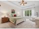 Relaxing main bedroom with plush carpet and large window at 7181 Three Kings Rd, Fort Mill, SC 29715