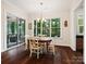 Breakfast nook with wood table and access to backyard deck at 7181 Three Kings Rd, Fort Mill, SC 29715