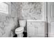Modern bathroom with white vanity and marble tile at 804 Rayon St, Charlotte, NC 28216