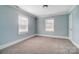 Spacious bedroom with neutral walls and carpet at 804 Rayon St, Charlotte, NC 28216