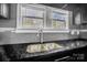 Kitchen sink with granite countertop and stainless steel faucet at 804 Rayon St, Charlotte, NC 28216