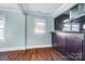 Modern kitchen with dark wood cabinets and granite countertops at 804 Rayon St, Charlotte, NC 28216