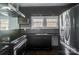 Modern kitchen with stainless steel appliances and dark wood cabinets at 804 Rayon St, Charlotte, NC 28216