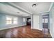 Open living space with hardwood floors and built-in bar at 804 Rayon St, Charlotte, NC 28216
