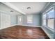 Spacious living area with wood floors and light blue walls at 804 Rayon St, Charlotte, NC 28216