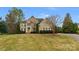 Two-story brick home situated on a large lot with mature trees at 8514 Ulster Ct, Indian Land, SC 29707