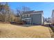 Exterior shot of a two-story home with a deck, grass, and a fence surrounding the yard at 857 Spelman Dr, Indian Land, SC 29707