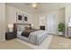 Nicely staged bedroom with neutral colors, a ceiling fan, and an attached bathroom at 857 Spelman Dr, Indian Land, SC 29707