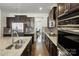 Kitchen with stainless steel appliances, granite countertops, and an island at 857 Spelman Dr, Indian Land, SC 29707