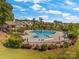 Community pool with a fun water feature at 857 Spelman Dr, Indian Land, SC 29707