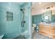 Modern bathroom featuring blue subway tile shower and vanity with marble countertop at 10111 Grimsby Ct, Huntersville, NC 28078