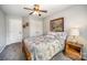 Bedroom with gray walls, carpeted floor, closet and nightstand at 10111 Grimsby Ct, Huntersville, NC 28078