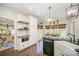 Modern kitchen with open shelving and view into the dining room at 10111 Grimsby Ct, Huntersville, NC 28078