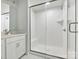 Bathroom with a glass shower and a tiled bench, showing a modern and clean space at 10117 Mamillion Dr, Huntersville, NC 28078