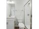 Bathroom with a white vanity, a toilet, and a glass-enclosed shower with white subway tiles at 10117 Mamillion Dr, Huntersville, NC 28078