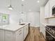 Spacious kitchen with a center island, stainless steel appliances, and modern finishes at 10117 Mamillion Dr, Huntersville, NC 28078