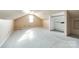 Simple attic bedroom with sloped ceilings and built-in shelving at 124 Piedmont St, Rock Hill, SC 29730