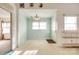 Small dining area with light teal walls and tile floor at 124 Piedmont St, Rock Hill, SC 29730