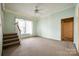 Light and airy living area with stairs and a ceiling fan at 124 Piedmont St, Rock Hill, SC 29730