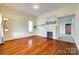 Bright living room featuring hardwood floors and a fireplace at 124 Piedmont St, Rock Hill, SC 29730