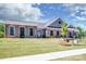 Community clubhouse with grey siding and brick accents at 127 Doncaster Dr, Mooresville, NC 28115