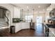 Modern kitchen with white cabinets and island at 127 Doncaster Dr, Mooresville, NC 28115