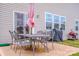 Private patio with table and chairs, perfect for outdoor dining at 127 Doncaster Dr, Mooresville, NC 28115