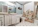 Charming bathroom with white vanity, floral shower curtain, and tile floor at 1419 Jules Ct, Charlotte, NC 28226