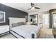 Bright bedroom featuring a comfortable bed and mirrored closet doors at 1419 Jules Ct, Charlotte, NC 28226