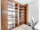 Built-in wooden bookshelves in a home office at 1419 Jules Ct, Charlotte, NC 28226