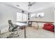 Bright home office features built-in shelving and a standing desk at 1419 Jules Ct, Charlotte, NC 28226