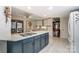 Modern kitchen with a large island and views to the living room at 1419 Jules Ct, Charlotte, NC 28226