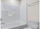 Simple bathroom with a shower/tub combo and toilet at 1455 Southwest Blvd, Newton, NC 28658