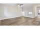 Bright bedroom with neutral walls, ceiling fan, and carpet flooring at 1455 Southwest Blvd, Newton, NC 28658